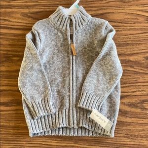 NWT Carter’s zip up sweater. Size 2T. Very warm!
